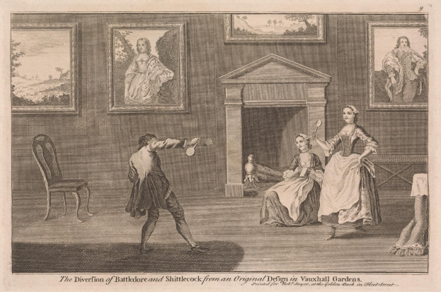 Zwei Personen spielen Tischtennis in einem Raum mit Kamin, Stühlen und gerahmten Fotos an der Wand, mit Text unten, der "Die Abweichung von Battledore und Shuttlecock von einem Originaldesign in Vauxhall Gardens" lautet.