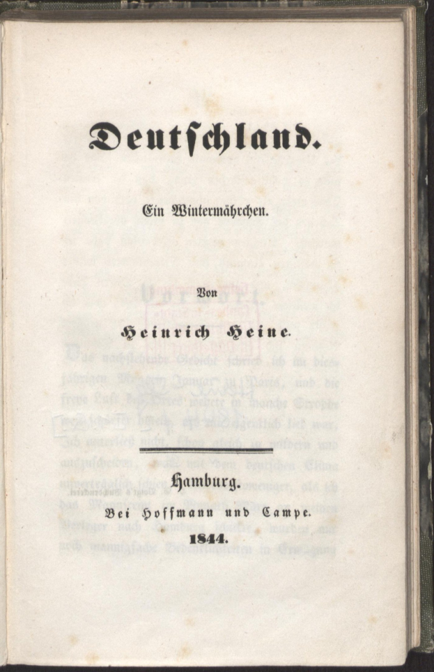 Ein geschlossenes altes Buch mit dem Titel "Deutschland" auf dem Cover vor einem schwarzen Hintergrund.