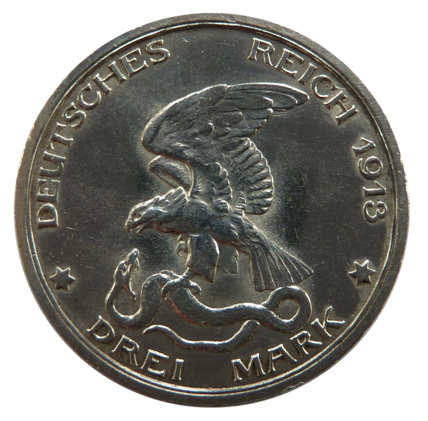 Silbermünze mit einem Adler, der eine Schlange umklammert, Flügel gespreizt, Inschrift "Deutsches Reich" auf weißem Hintergrund.