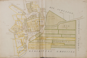 Ein altes Buch mit einer detaillierten Karte von Hamburg, Deutschland, mit sichtbaren Straßen, Gebäuden und Sehenswürdigkeiten sowie Texten mit Informationen über die Stadt.
