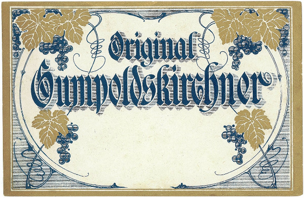 Altes deutsches Wein-Etikett mit einer Illustration von Trauben und Blättern sowie einem Text, der den Wein-Typ angibt.