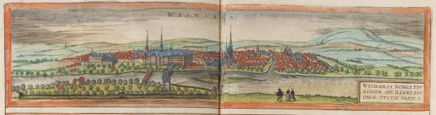 An open book displaying a drawing of Weimar, a city surrounded by trees, buildings, and hills, with text on the right side reading 'Weimar, the city of Weimar'.